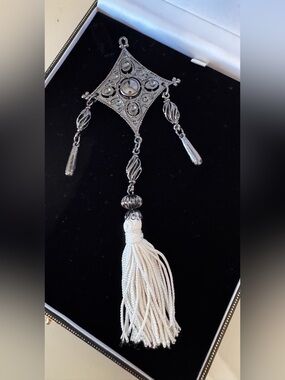 Black Decorative Brooch with Cream Tassel